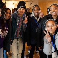 Girls of Color Summit previous event a group taking a photo